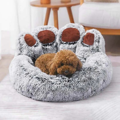 Cama de casa con forma de pata de oso para mascotas